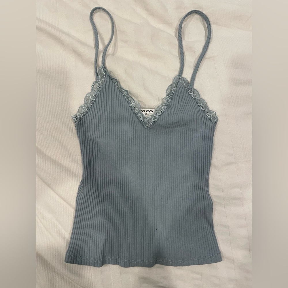 Blue Tilly’s V-neck tank top